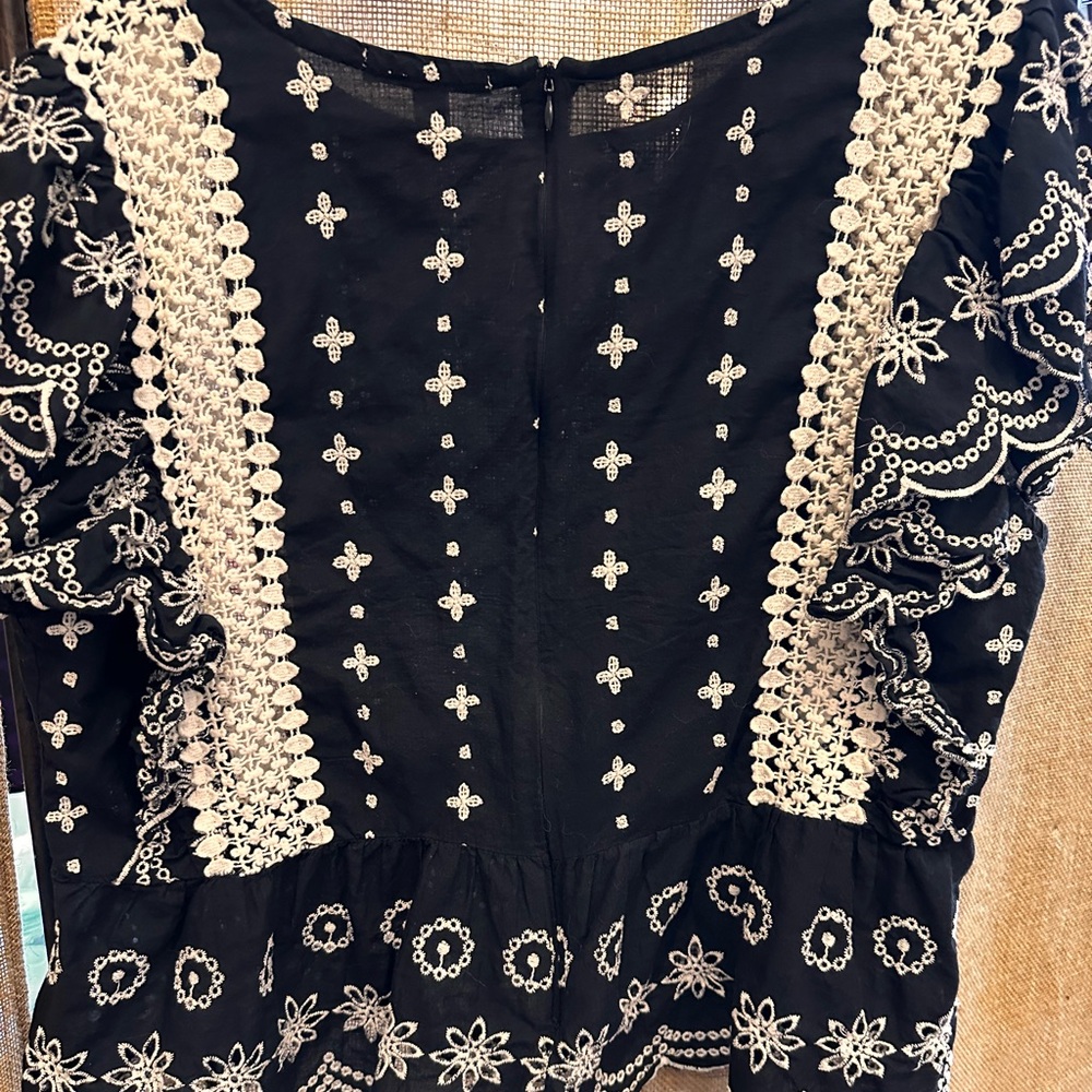 Monograph Blouse - black background w/ white trim. 
Size XL. Gorgeous detail.